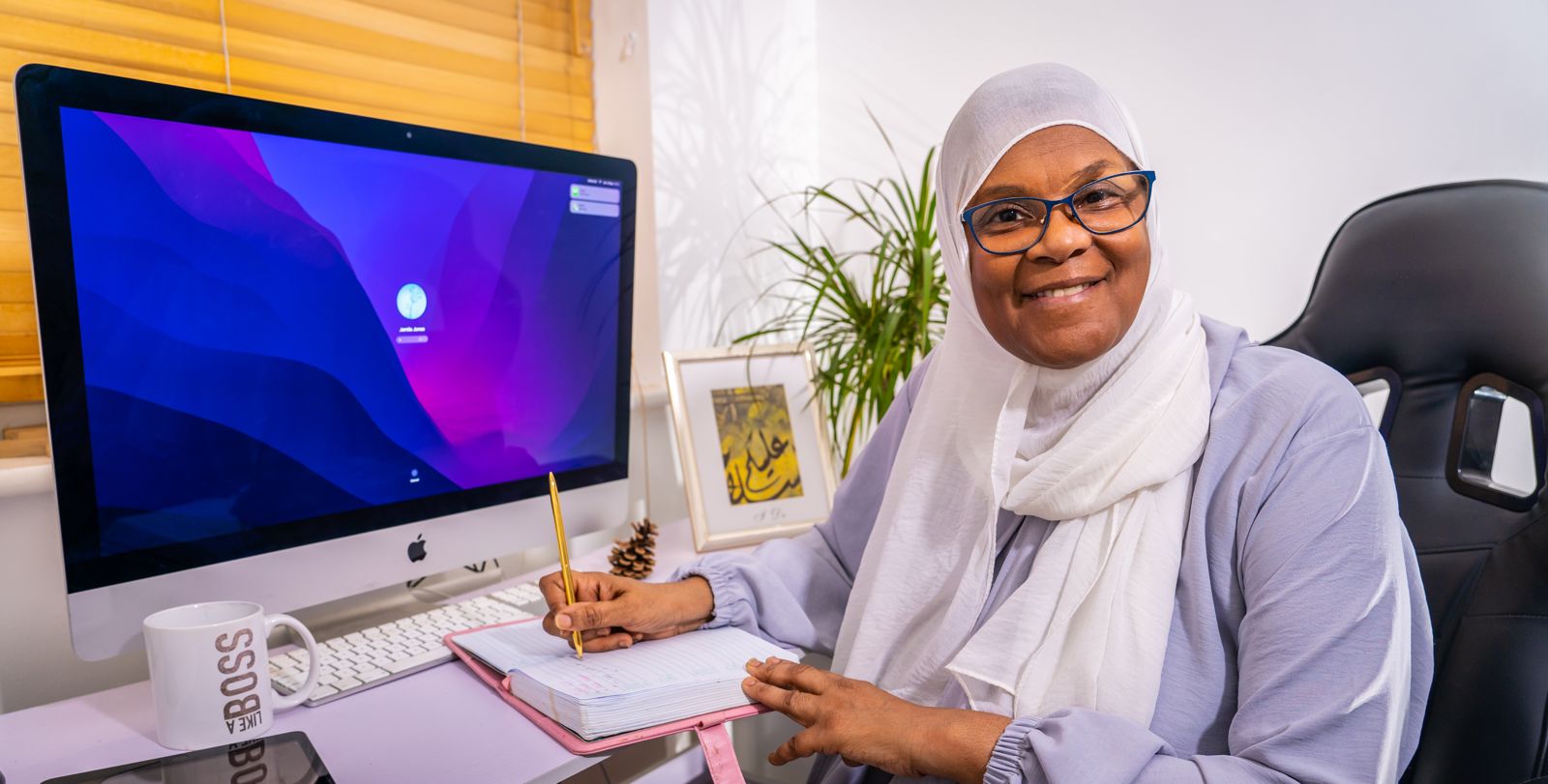 Jamila in her workspace
